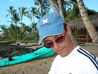 Kevin on the beach at the Kona Village
