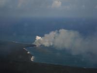 The lava flowing into the ocean