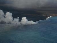 The lava flowing into the ocean